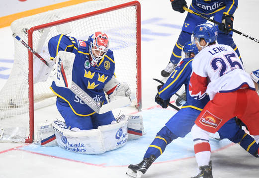 Sweden's goalie Lars Johansson makes a save