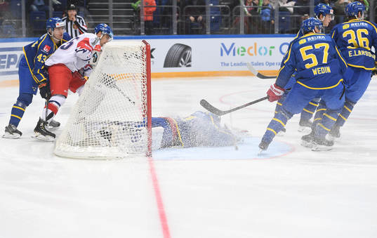 Sweden's goalie Lars Johansson makes a save