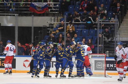 Sweden's players celebrate team's goal