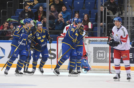 Sweden's players celebrate team's goal