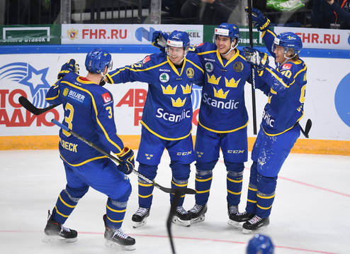 Sweden's Michael Lindqvist, 2nd right, celebrates his goal