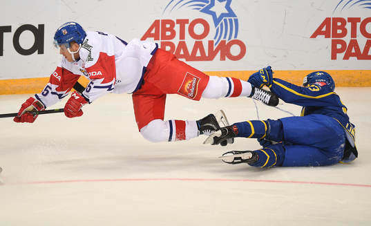 Czech Republic's Filip Pavlik falls over Sweden's Michael