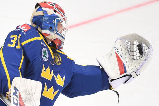 Sweden's goalie Lars Johansson makes a save