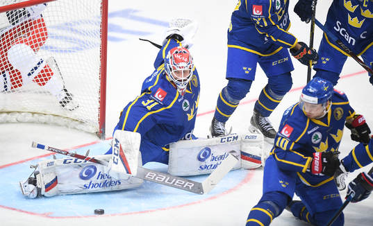 Sweden's goalie Lars Johansson makes a save