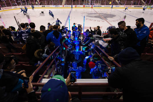 Elias Pettersson of Vancouver Canucks makes an entrance for
