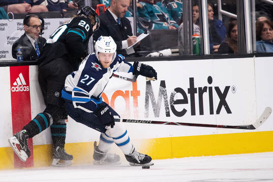 Marcus Sörensen of San Jose Sharks and Nikolaj Ehlers of