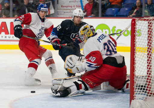 Goalie Jiri Patera #30 of the Czech Republic stops Logan