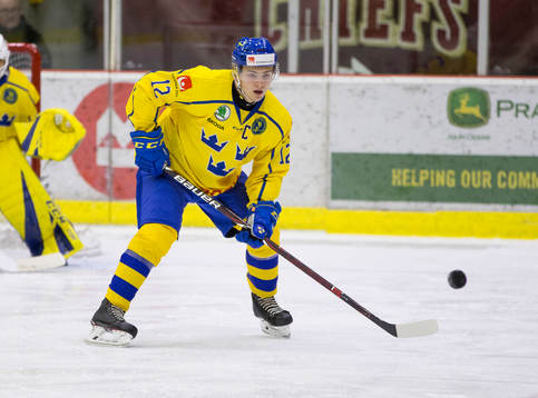 Sweden defenceman Erik Brännström (12)  in action