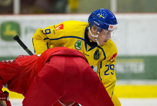 Sweden forward Pontus Holmberg (29)  in action  against