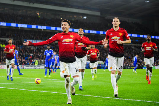 Jesse Lingard of Manchester United celebrates with teammates