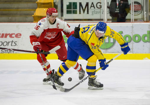 Denmark forward Jonas Røndbjerg (16) battles with Sweden