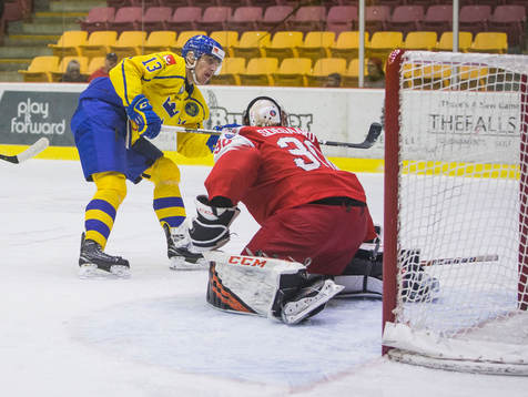 Sweden forward Johan Södergran (13) scores Denmark goalie