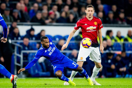 Junior Hoilett of Cardiff and Nemanja Matic of Manchester