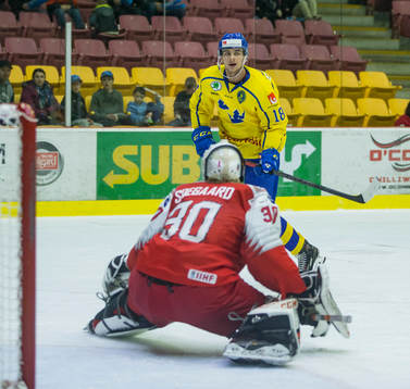 Sweden forward Jacob Olofsson (18)  scores in  overtime