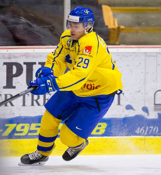 Sweden forward Pontus Holmberg (29)  in action  against
