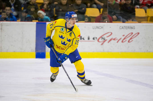 Sweden forward Oskar Bäck (15)  in action against Denmark