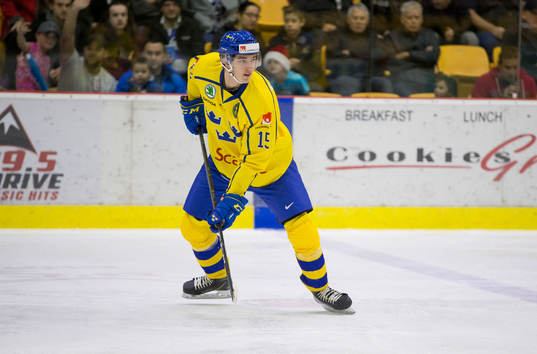 Sweden forward Oskar Bäck (15)  in action against Denmark
