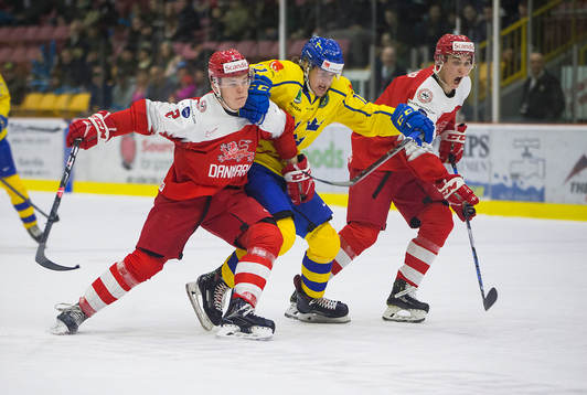Sweden forward Samuel Fagemo (11) battles with Denmark