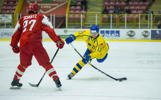 Sweden forward Johan Södergran (13)  shoots past Denmark