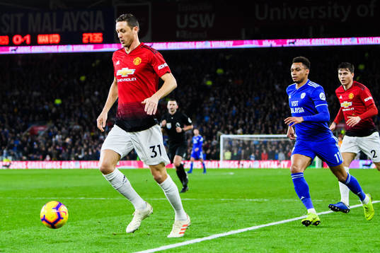 Nemanja Matic of Manchester United and Josh Murphy of