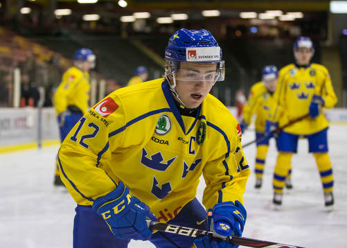 Sweden defenceman Erik Brännström (12) in action against