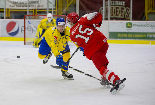 Sweden defenceman Rasmus Sandin (8) blocks a shot taken by
