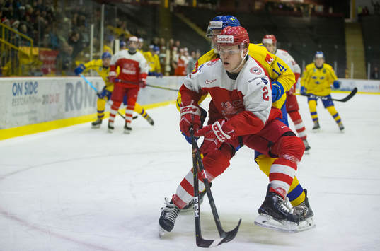 Sweden forward Hugo Leufvenius (14)  checks Denmark