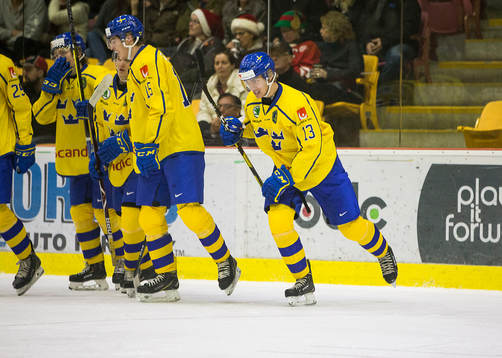 Sweden forward Johan Södergran (13) celebrates his second