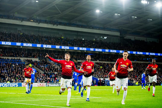 Jesse Lingard of Manchester United celebrates with teammates