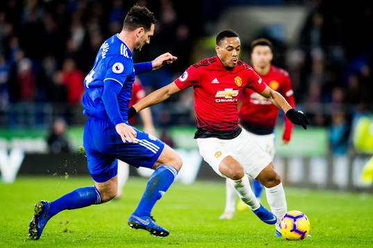 Sean Morrison of Cardiff and Anthony Martial of Manchester