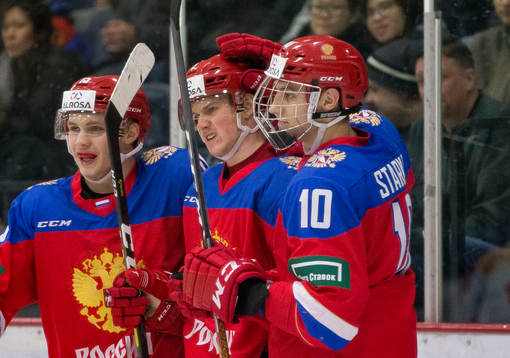 Russia forward Nikolay Kovalenko (15)  and defenceman