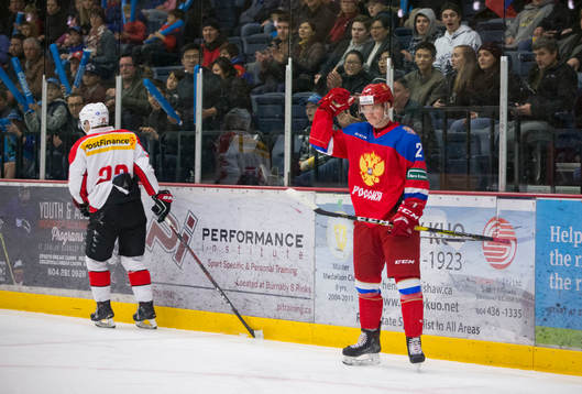 Russia defenceman Daniil Zhuravlev (2) celebrates his