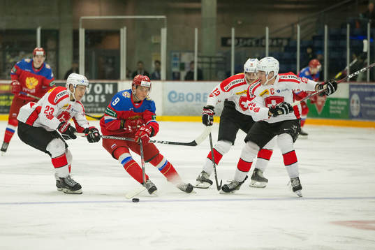 Switzerland forward Philipp Kurashev (23) and forward Nando