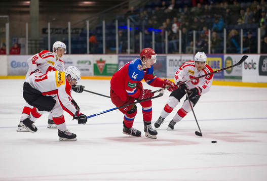 Switzerland defenceman Tim Berni (21)  checks Russia