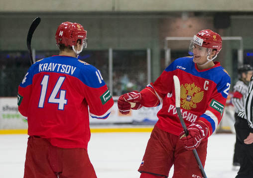 Russia forward Vitalii Kravtsov (14) and forward Klim