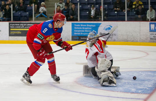 Russia forward Artem Galimov (9) scores