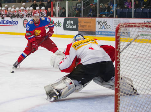 Russia forward Grigory Denisenko (28)  shoots