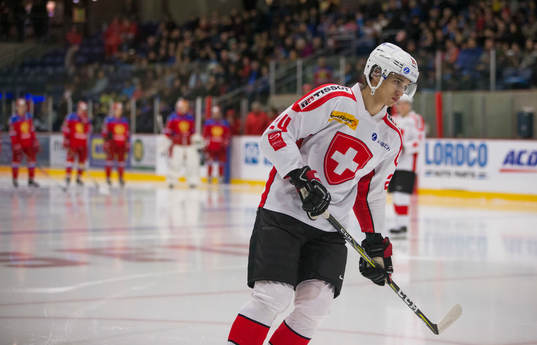 Switzerland defenceman Tobias Geisser (24)