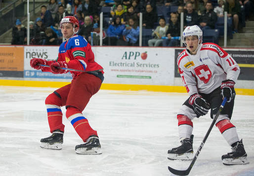 Russia defenceman Ilia Morozov (6)  and Switzerland forward