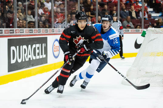 Nicholas Suzuki of Canada and Samuli Vainionpää of Finland