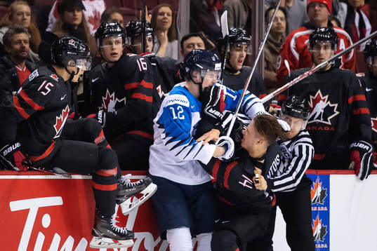 Samuli Vainionpää of Finland in a fight with Maxime