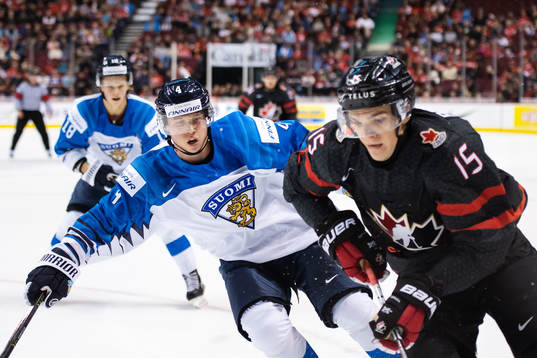 Aleksi Anttalainen of Finland and Shane Bowers of Canada