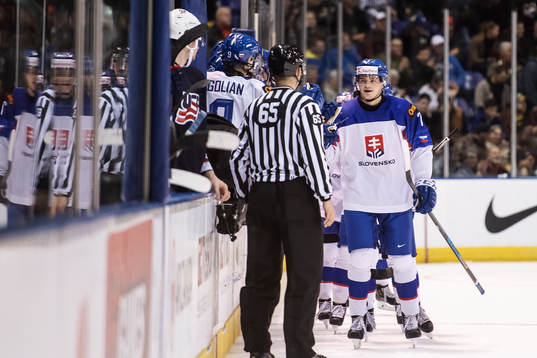 Marek Korencik of Slovakia celebrates with teammates