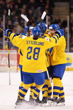 Players of team Sweden celebrate