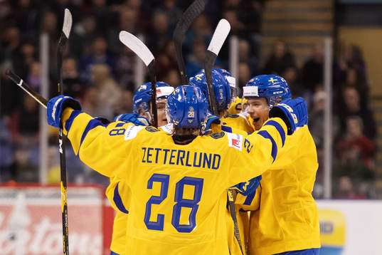 Players of team Sweden celebrate