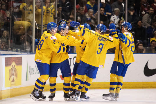 Erik Brännström of Sweden celebrates with teammates