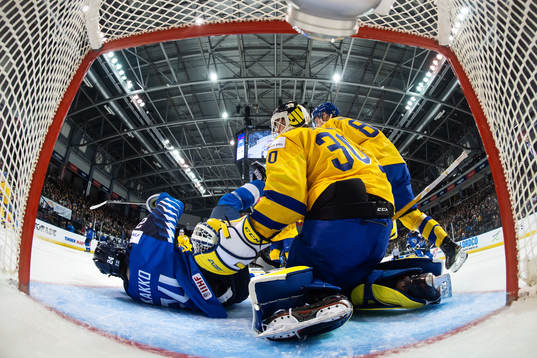 Kaapo Kakko of Finland and goaltender Samuel Ersson of
