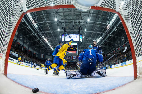 Rickard Hugg of Sweden celebrates