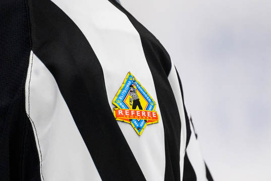 Ett emblem för domare
