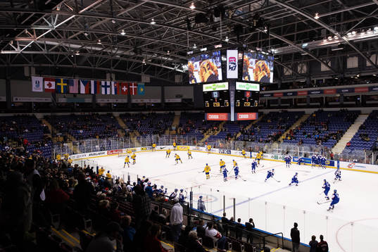 Players of Sweden and Slovakia warm up